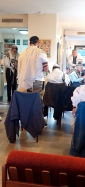 תפילה וקריאת מגילה בבית משפחת פישר